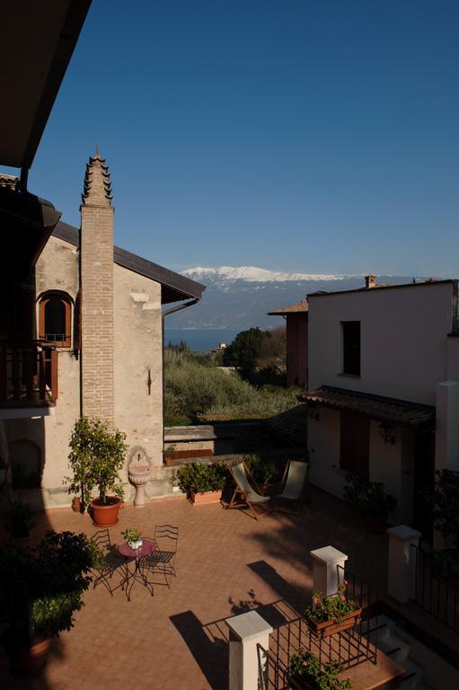 Albergo Locanda Cavallino Toscolano Maderno Rum bild